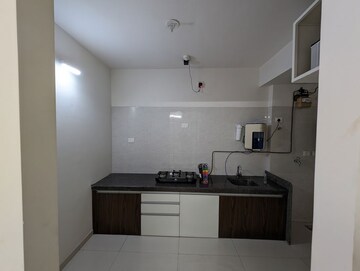 Kitchen in 2 BHK Apartment at Duville Riverdale Heights, Kharadi – for Rent