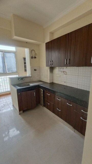 Kitchen in 2 BHK Apartment at Antriksh Golf View, Sector 78 – for Rent