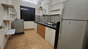 Kitchen in 2 BHK Apartment at Rizvi Heights, Senapati Bapat Marg – for Rent