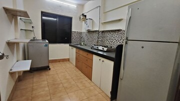 Kitchen in 2 BHK Apartment at Rizvi Heights, Senapati Bapat Marg – for Rent