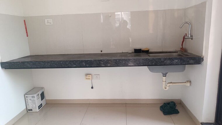 Kitchen, shapoorji-pallonji-joyville-hinjewadi 2 Bedroom 700 Sq.Ft. Apartment In Hinjewadi Pune 9730529