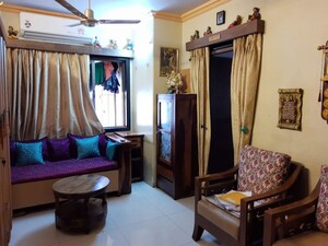 Living Room in 1 BHK Apartment at Shubharambh Complex, Manpada – for Sale