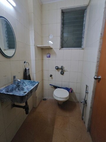 Bathroom in 2 BHK Apartment at Vinayak Tower, Andheri West – for Rent