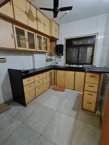 Kitchen in 2 BHK Apartment at Vinayak Tower, Andheri West – for Rent