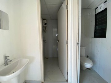 Bathroom in 1 BHK Apartment at Runwal Gardens Phase 2, Dombivli East – for Rent