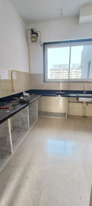 Kitchen in 3 BHK Apartment at Courtyard by Narang Realty and The Wadhwa Group, Pokhran Road No Two – for Rent