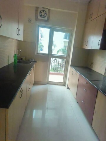 Kitchen in 2 BHK Apartment at Aims Golf Avenue I, Sector 75 – for Rent