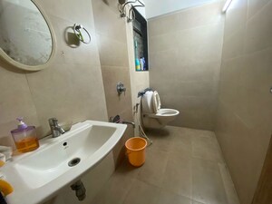 Bathroom in 2 BHK Apartment at Andheri CHS, Andheri West – for Rent