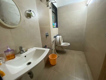 Bathroom in 2 BHK Apartment at Andheri CHS, Andheri West – for Rent