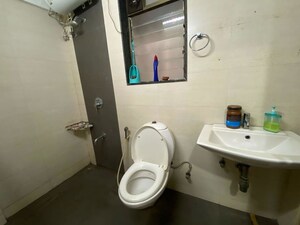 Bathroom in 2 BHK Apartment at Andheri CHS, Andheri West – for Rent
