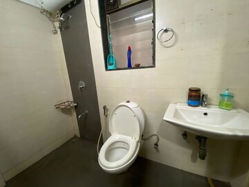 Bathroom in 2 BHK Apartment at Andheri CHS, Andheri West – for Rent