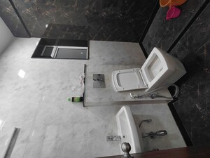 Bathroom in 2 BHK Apartment at Triumph Swastik, Malad West – for Sale