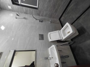 Bathroom in 2 BHK Apartment at Triumph Swastik, Malad West – for Sale