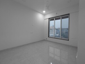 Room in 2 BHK Apartment at Triumph Swastik, Malad West – for Rent