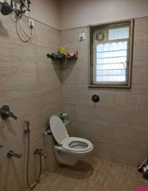 Bathroom in 2 BHK Apartment at Shiv Shakti CHS Malad West, Malad West – for Sale
