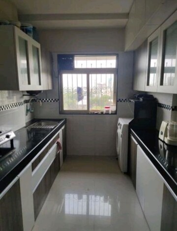 Kitchen in 2 BHK Apartment at Shiv Shakti CHS Malad West, Malad West – for Sale