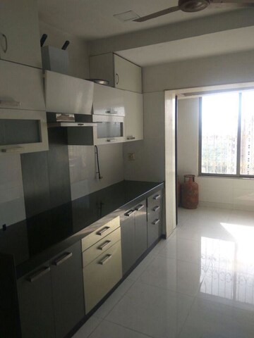 Kitchen in 3 BHK Apartment at Gemstar Nestle Apartments, Malad West – for Rent