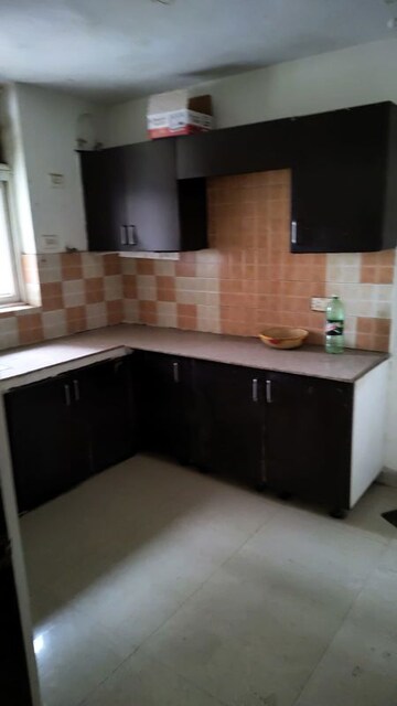 Kitchen in 2 BHK Apartment at Ansal Housing Woodbury, Patiala Road – for Rent