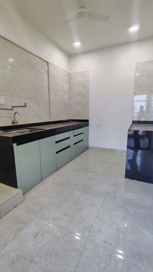 Kitchen in 2 BHK Apartment at Rama Metro Life, Tathawade – for Rent