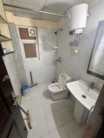 Bathroom in 2 BHK Apartment at Gardenia Golf City, Sector 75 – for Rent