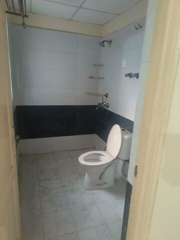 Bathroom in 2 BHK Apartment at Aims Golf City, Sector 75 – for Rent