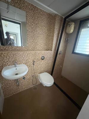 Bathroom in 2 BHK Apartment at Lodha Lakeshore Greens, Dombivli East – for Rent
