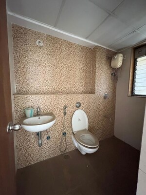 Bathroom in 2 BHK Apartment at Lodha Casa Lagoona, Shilphata – for Sale