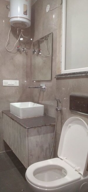 Bathroom in 2 BHK Builder Floor at Munjal Tower, Sector 12 – for Rent