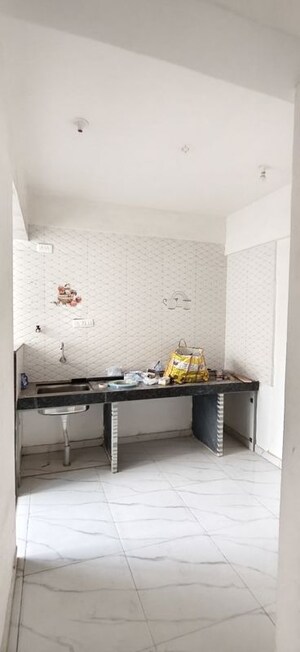 Kitchen in 1 BHK Apartment at Wadgaon Sheri – for Rent