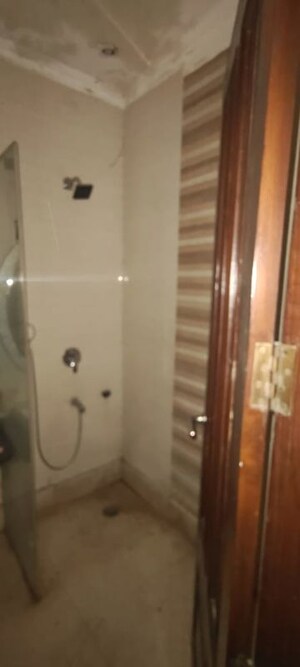 Bathroom in 4 BHK Builder Floor at Roop Nagar – for Rent