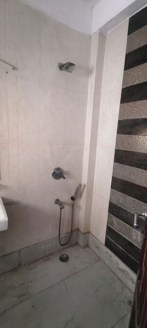 Bathroom in 4 BHK Builder Floor at Roop Nagar – for Rent