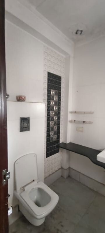 Bathroom in 4 BHK Builder Floor at Roop Nagar – for Rent