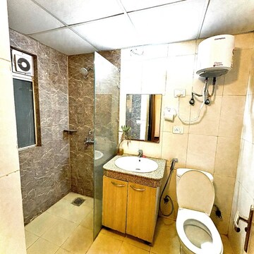 Bathroom in Studio Apartment at Nimbus The Golden Palm, Sector 168 – for Sale