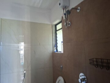 Bathroom in 1 BHK Apartment at Vihang Valley Phase 3, Kasarvadavali – for Rent