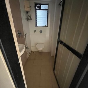 Bathroom in 2 BHK Apartment at Aditya Borivali Nandkuvar CHS LTD, Vivekanand Nagar – for Rent