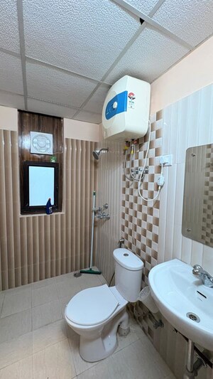 Bathroom in 3 BHK Apartment at Ansal API Celebrity Gardens, Sushant Golf City – for Rent