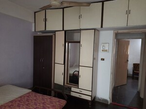 Bedroom in 1 BHK Apartment at Ranade Yashodhan, Mayur Colony – for Rent