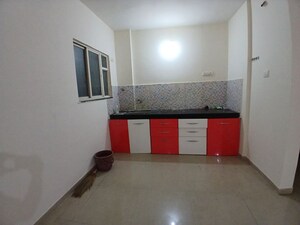 Kitchen in 2 BHK Apartment at Jalan Aura County Pune, Wagholi – for Rent