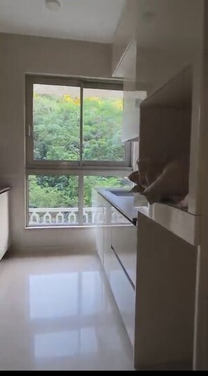 Kitchen in 2 BHK Apartment at Castle Rock, Powai – for Sale