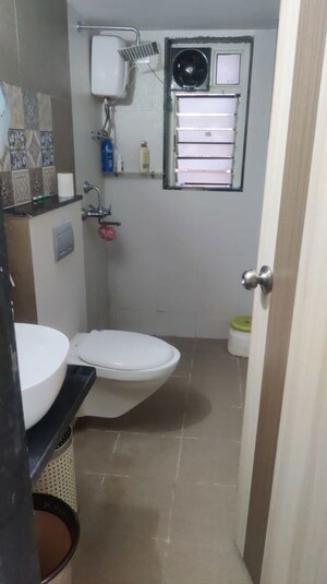 Bathroom in 2 BHK Apartment at Jangid Galaxy, Ghodbunder Road – for Rent