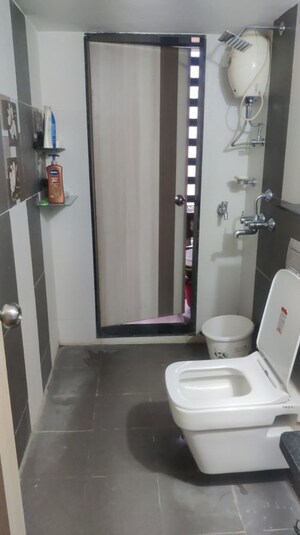 Bathroom in 2 BHK Apartment at Jangid Galaxy, Ghodbunder Road – for Rent