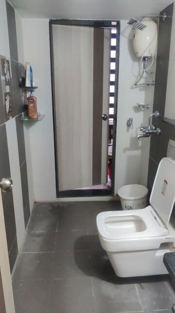 Bathroom in 2 BHK Apartment at Jangid Galaxy, Ghodbunder Road – for Rent