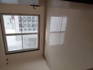 Room in 2 BHK Apartment at Je and Vee Madhuban, Malad East – for Sale