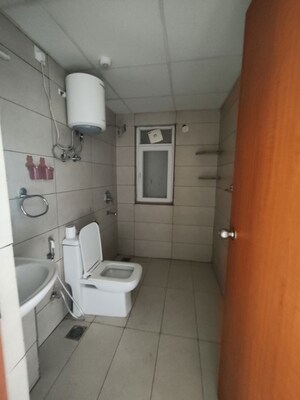 Bathroom in 3 BHK Apartment at Tata Eureka Park, Sector 150 – for Rent