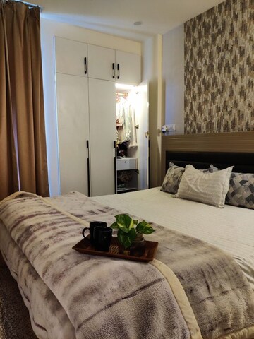 Bedroom in 3.5 BHK Apartment at Rishita Mulberry Heights, Sushant Golf City – for Rent