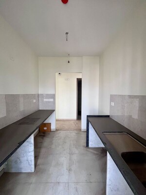 Kitchen in 2 BHK Apartment at Kalpataru Paramount A, Kapur Bawdi – for Sale