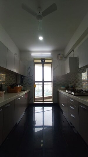 Kitchen in 3 BHK Apartment at Rustomjee Adarsh Excellency, Malad West – for Sale