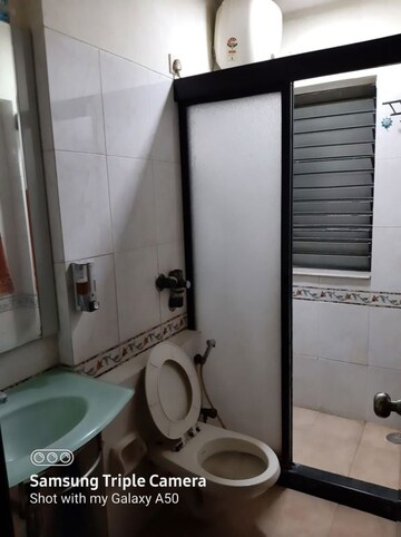 Bathroom in 1 BHK Apartment at K Raheja Palm Court, Malad West – for Sale