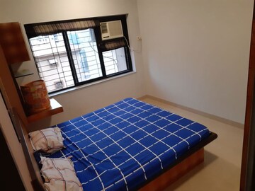 Bedroom in 1 BHK Apartment at K Raheja Palm Court, Malad West – for Sale