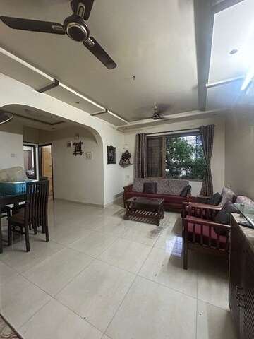 Living Room in 2 BHK Apartment at Charms Residency CHS, Brahmand – for Sale
